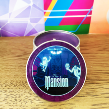 Load image into Gallery viewer, The Mansion Candle | 4 Ounces | Featuring Hitchhiking Ghosts, Ride Car, and Iconic Wallpaper from The Mansion
